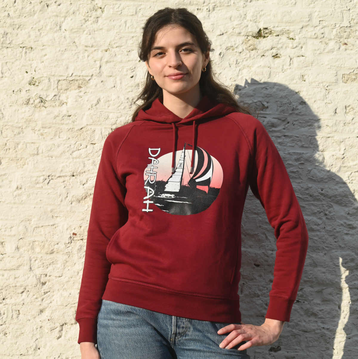 Beautiful high quality organic hoodie with print of a sailing boat designed by Dahrah Darah Fashion.