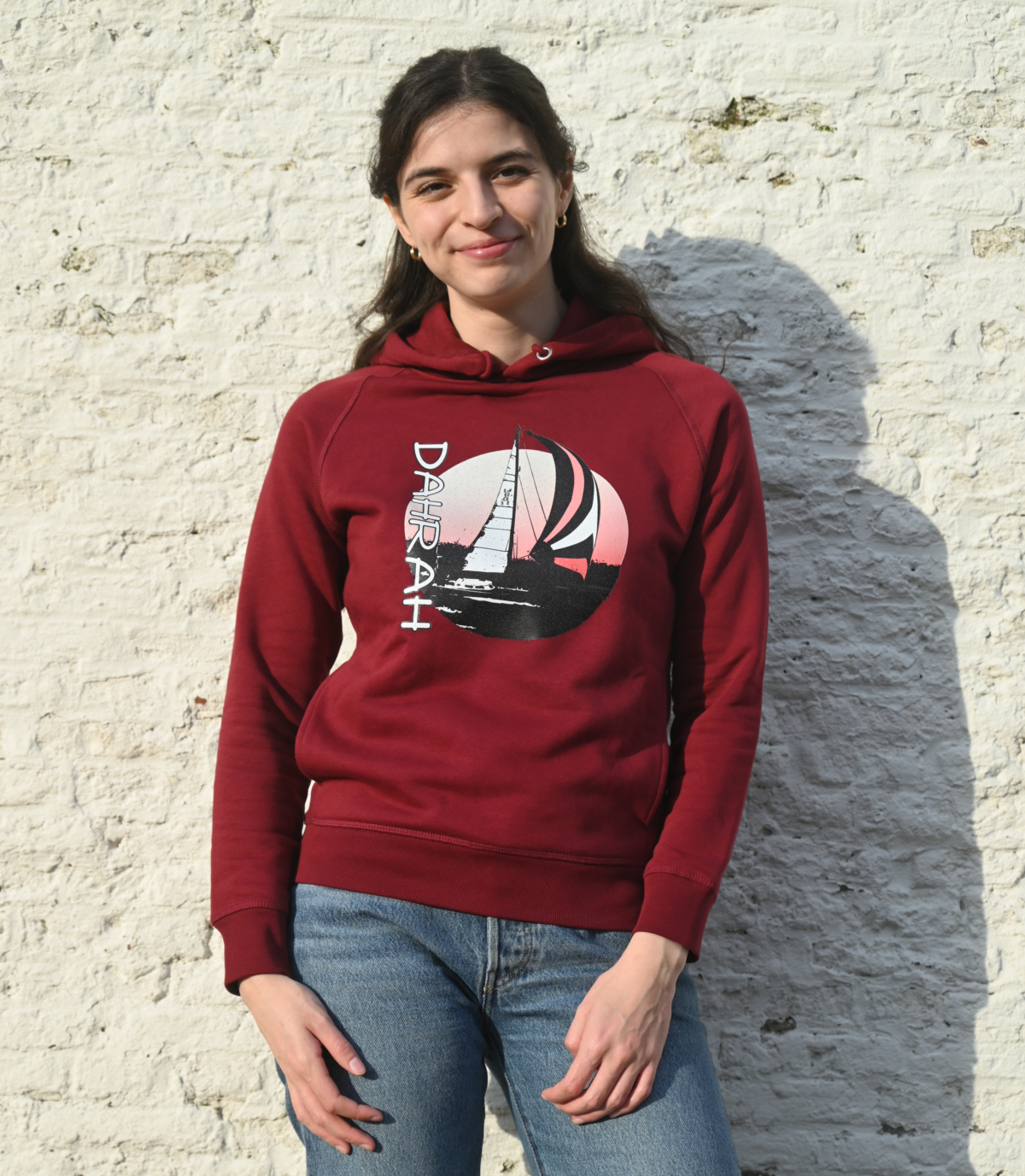 Beautiful high quality organic hoodie with print of a sailing boat designed by Dahrah Darah Fashion.