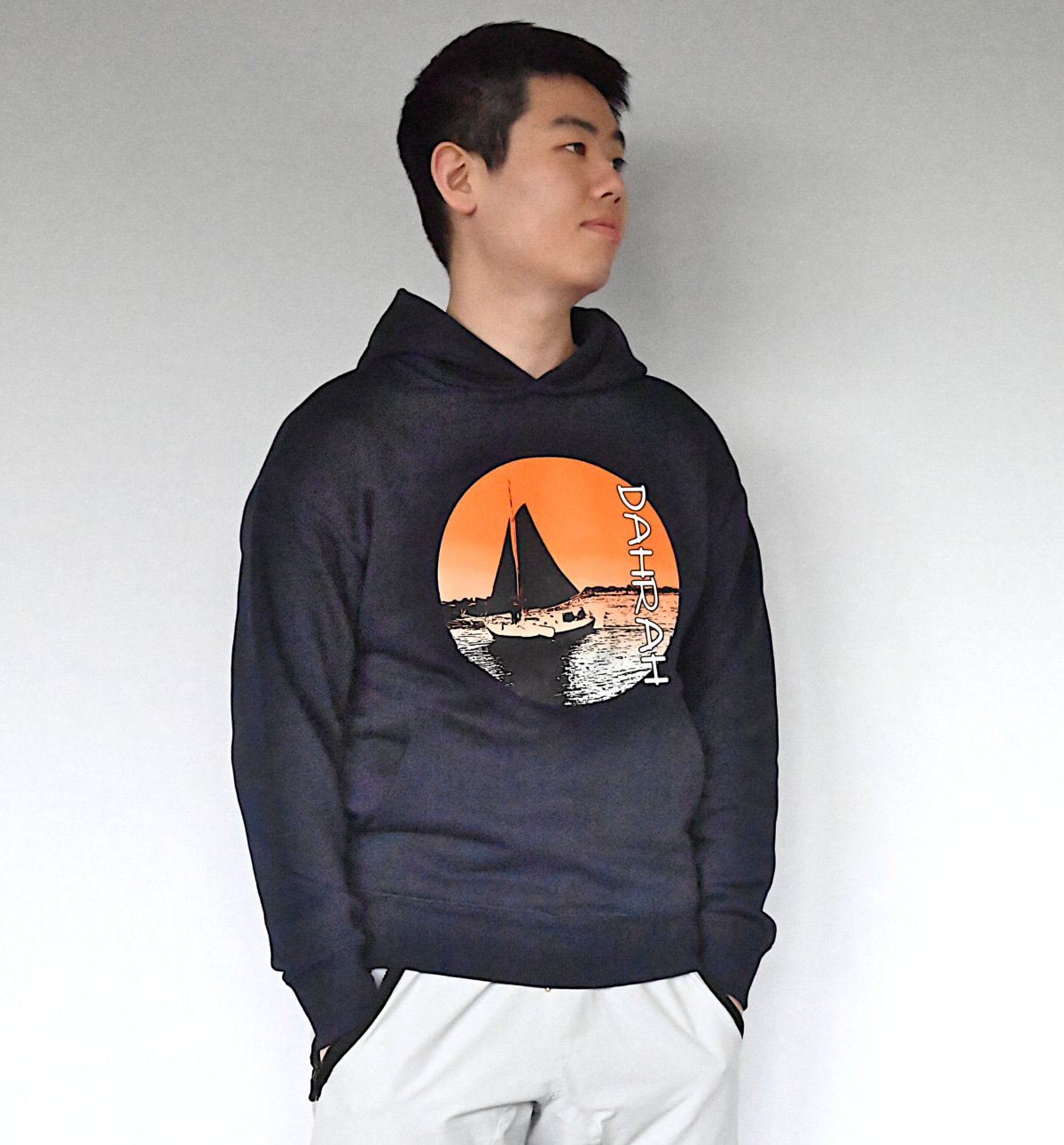 Comfortable oversized hoodie with print of a sailboat.