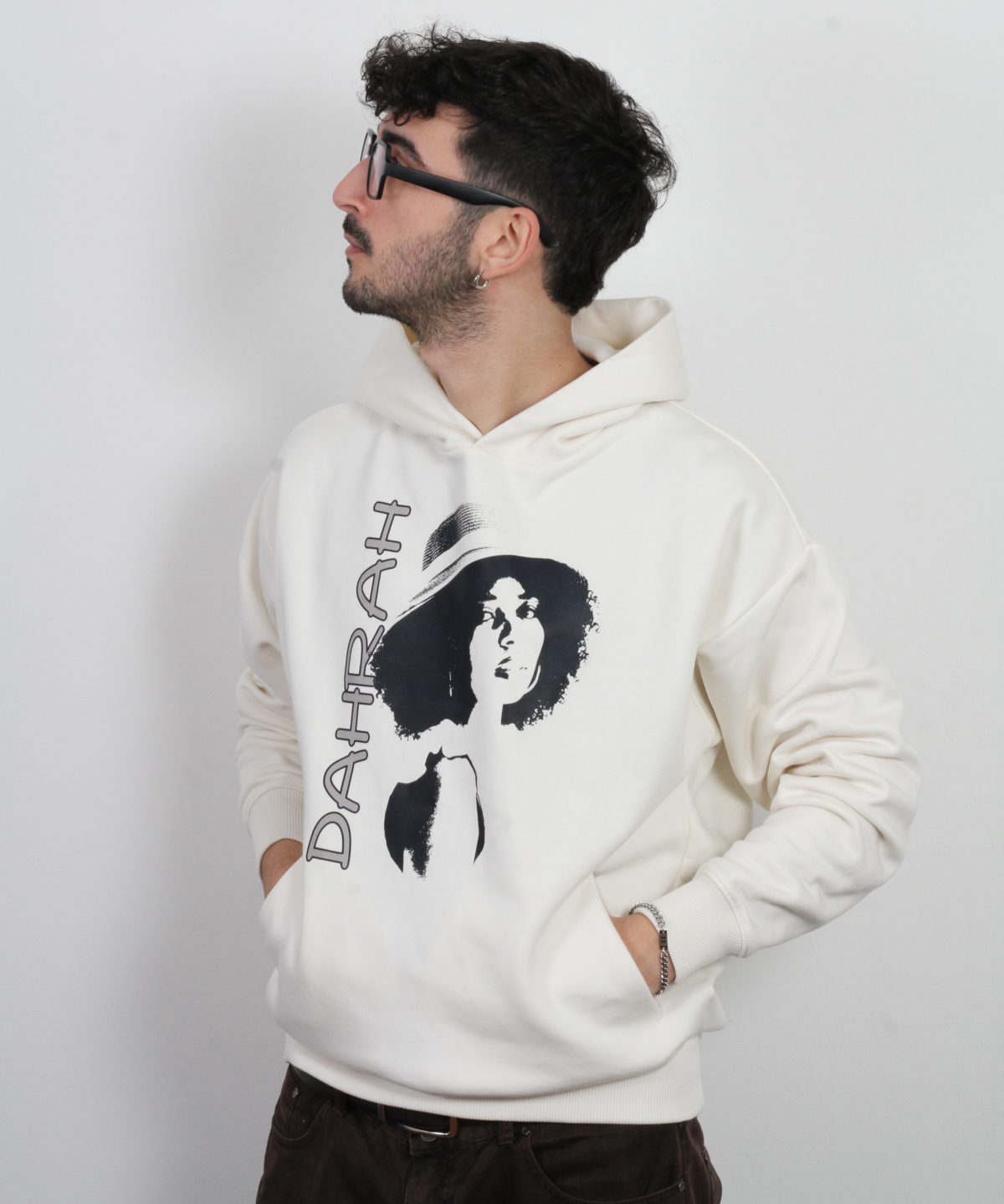 High quality oversized hoodie with print of a girl charming girl wearing a hat.