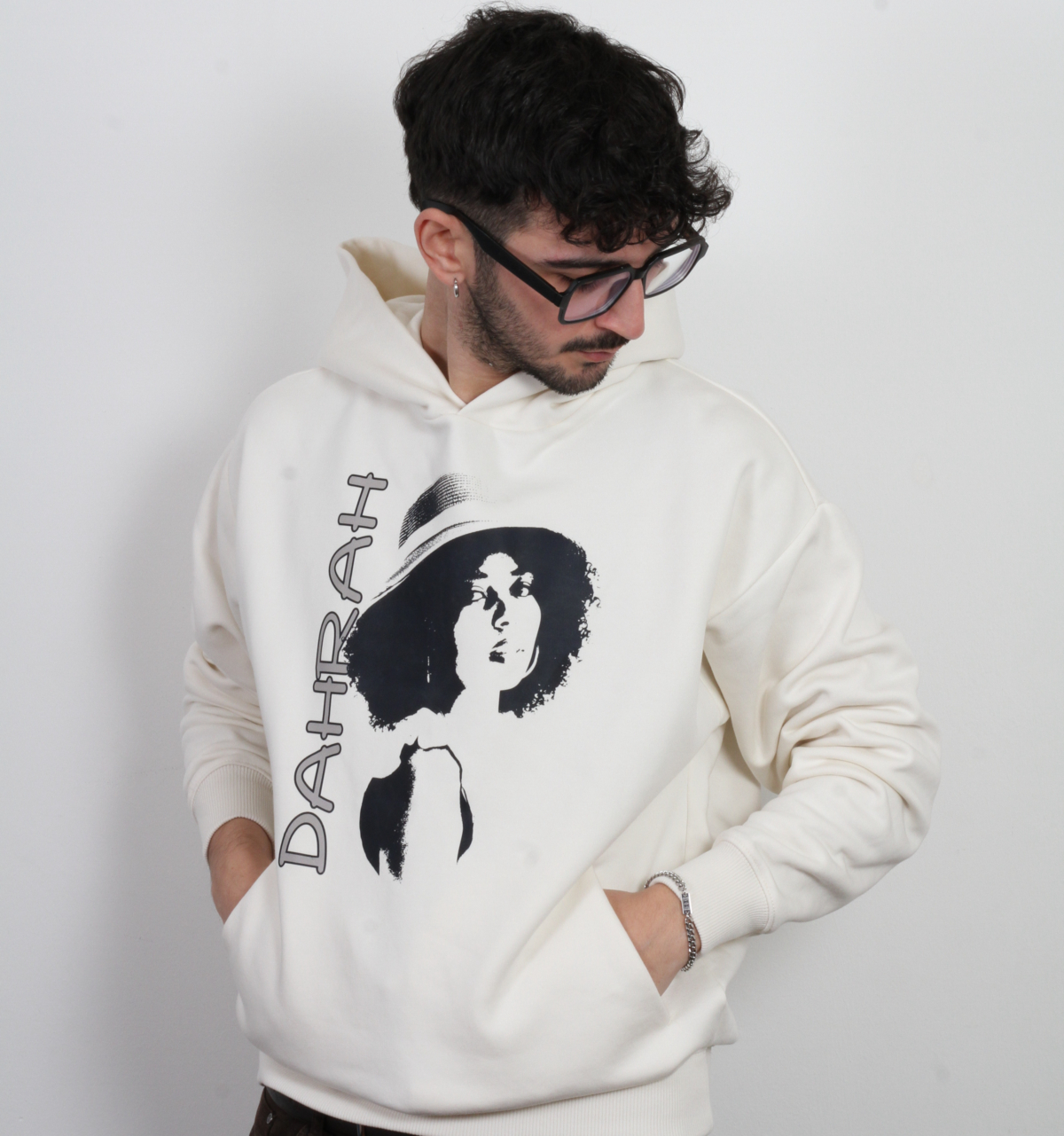 High quality oversized hoodie with print of a girl charming girl wearing a hat.