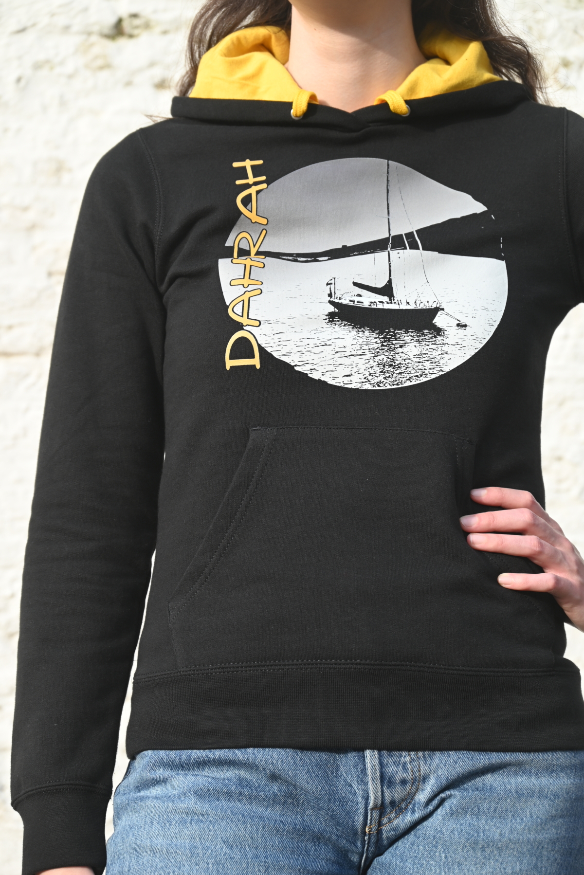 Beautiful organic hoodie with print of a sailboat.