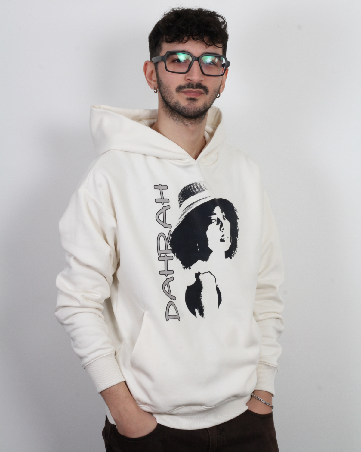 High quality oversized hoodie with print of a girl charming girl wearing a hat.